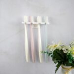 Colgador para cepilllos de dientes